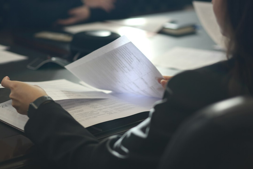 investigator reviewing documents